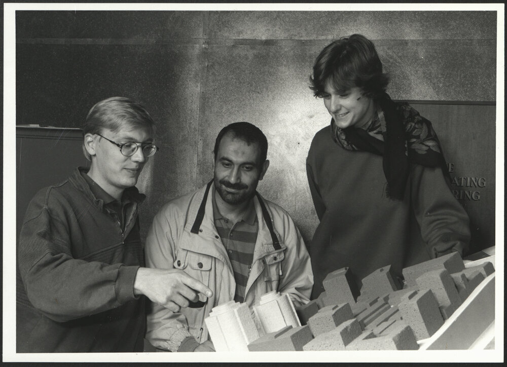 Three Architecture Students with Model Buildings