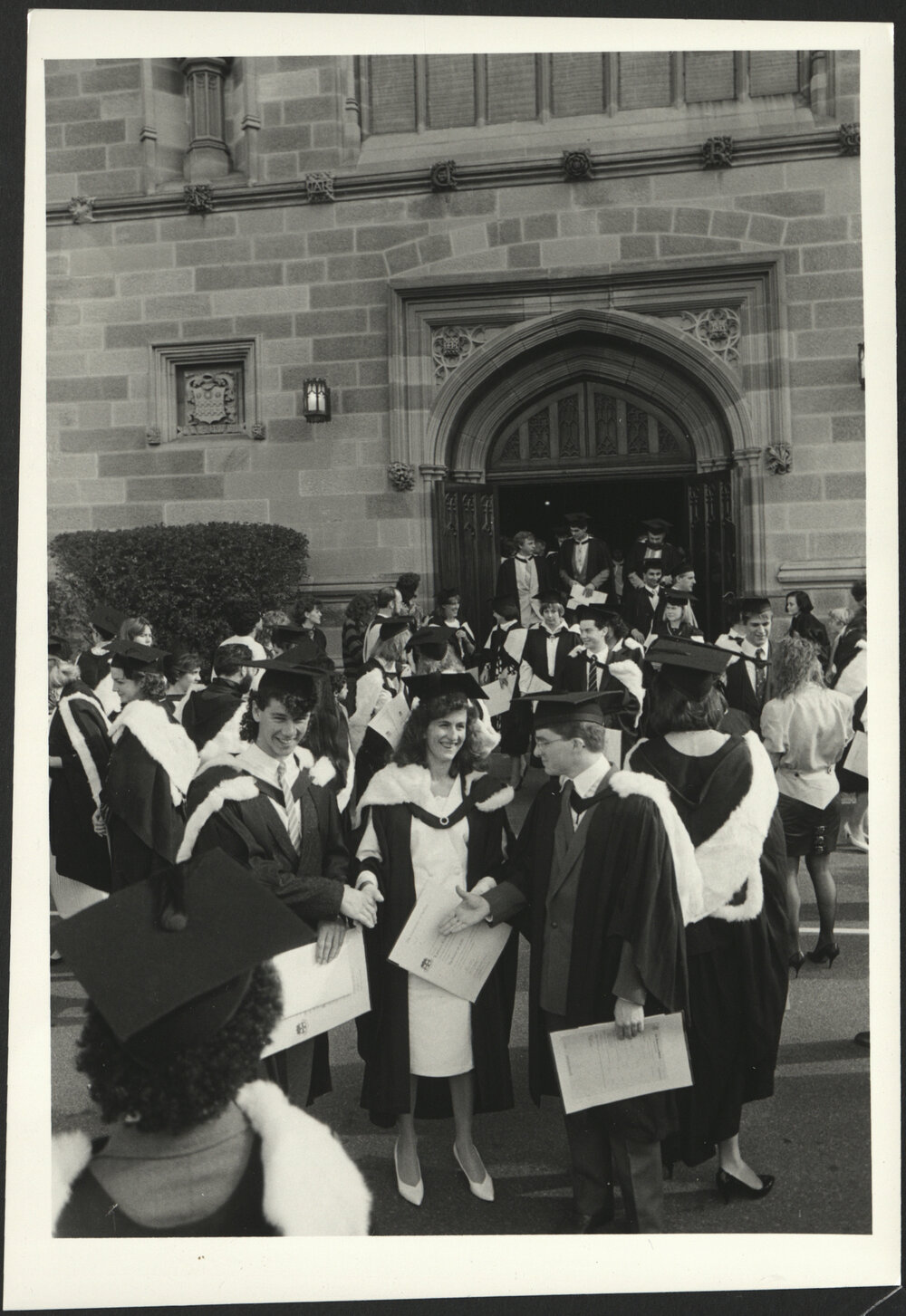 New Arts Graduates Outside Great Hall Holding Their Testamur