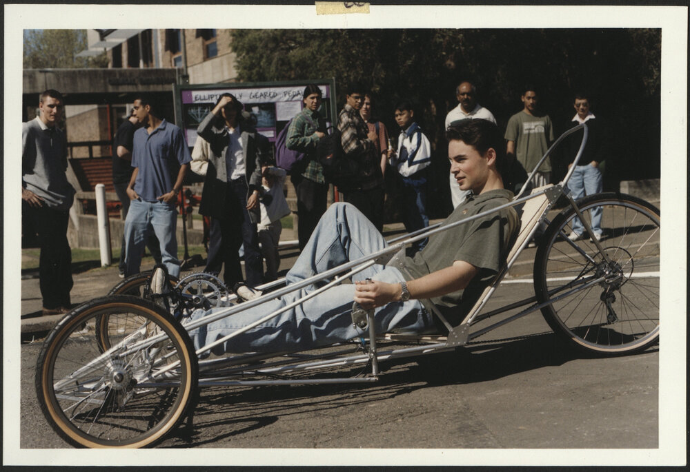 Engineering - Elliptical-Powered Pedal Car - Student Demonstrating the Use of the Car to Onlookers
