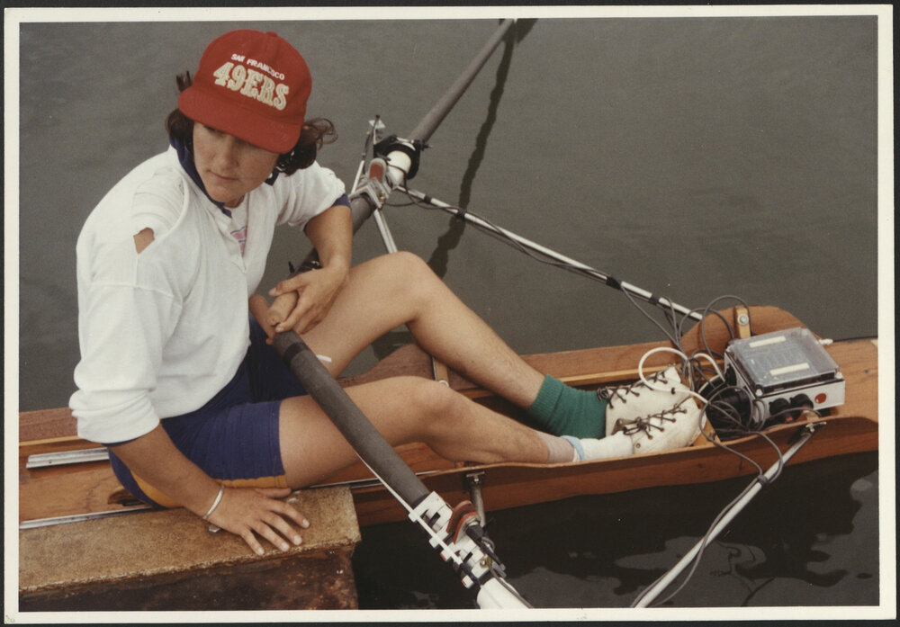 Health Sciences Student on Rowing Scull with Monitoring Equipment