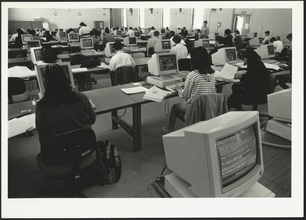 Large Class Room of Students Working in Computer Room