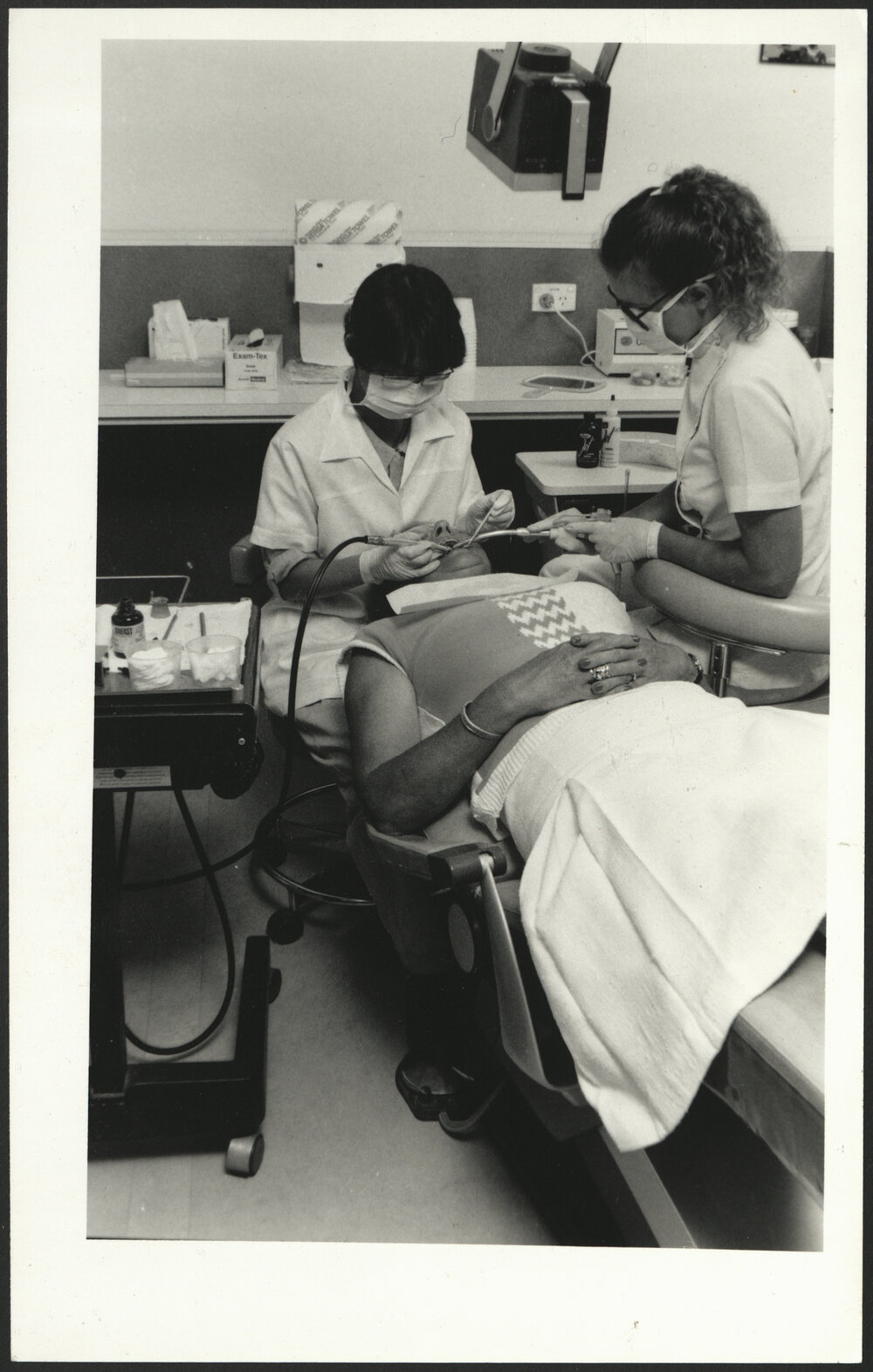 Dental Students Working on Patient