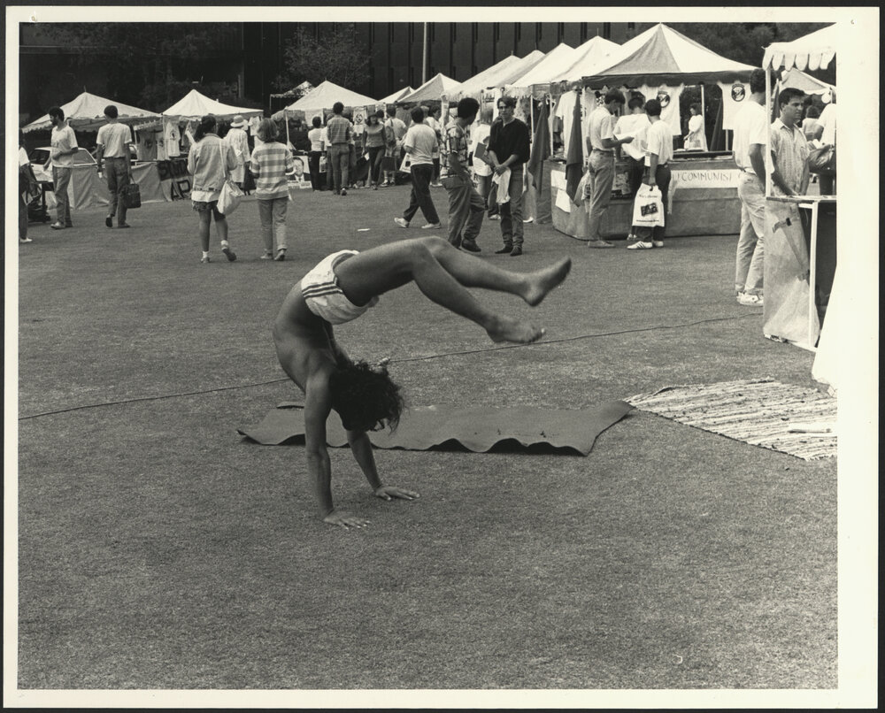 Student Doing Handstand on Front Lawn During Orientation Week