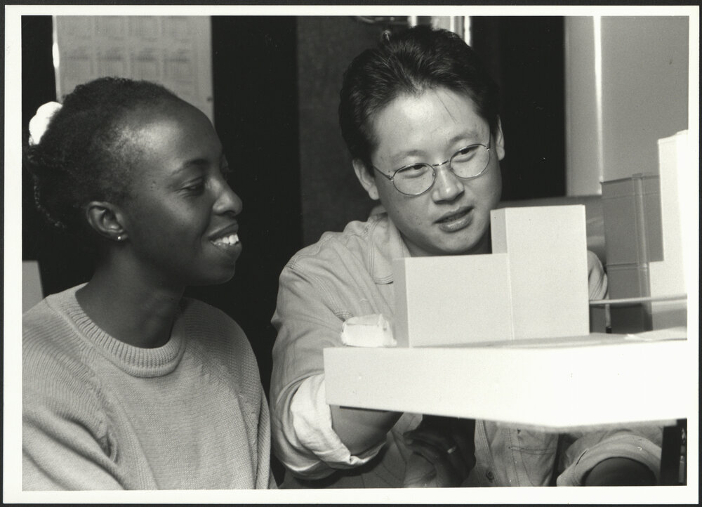 Two Architecture Students with Model Buildings