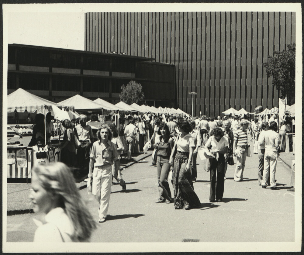 Students Crossing Across Front Lawn on the Walkway Coming from the Library During Orientation Week
