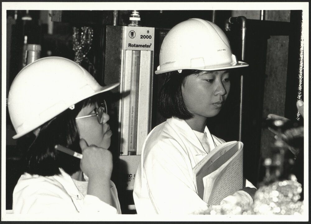 Two Women Chemical Engineering Students in a Workplace