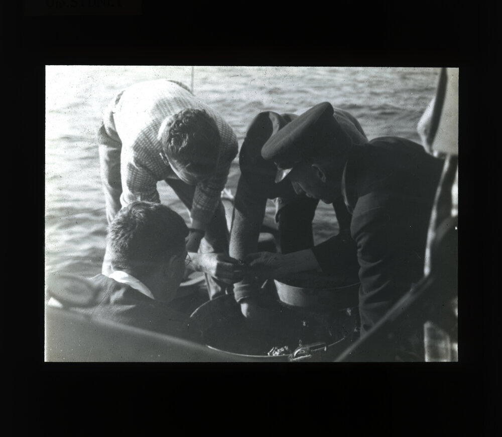 Men Working on Station Yacht Thistle