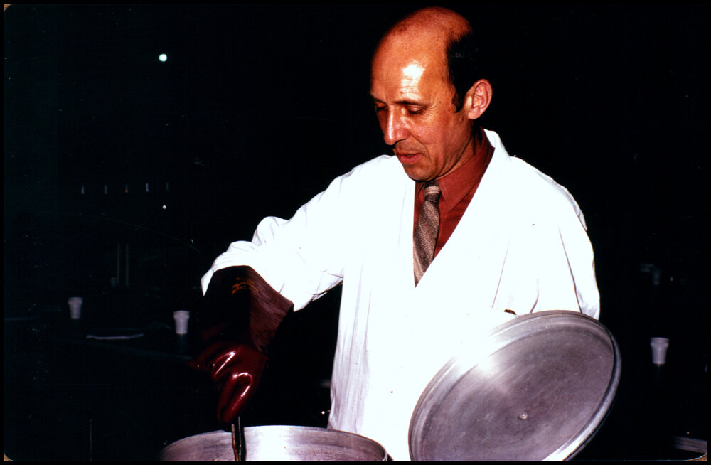 Peter Valder Serving Dinner in the Joseph Banks Lab