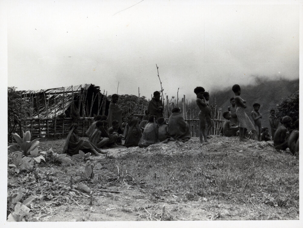 Group Gathered in Front of Buildings