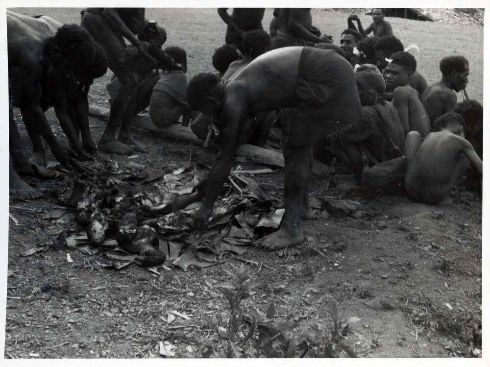 Men Preparing a Fire