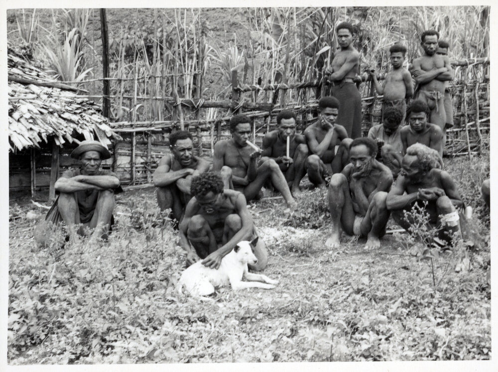 Group of Men Sitting