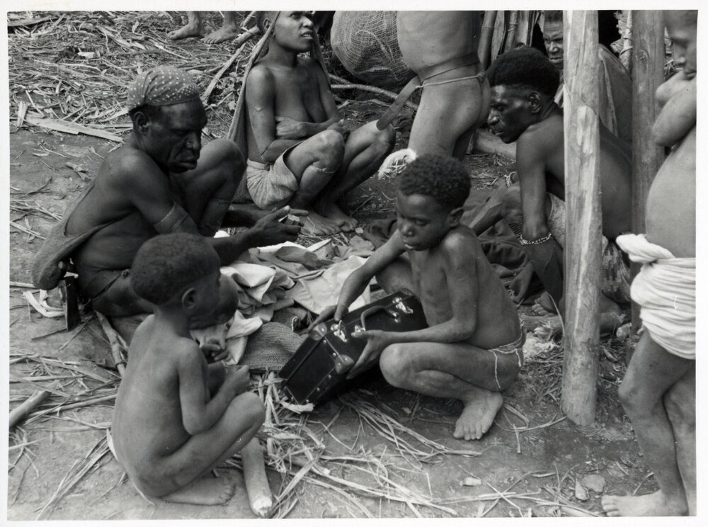 Children Playing with Briefcase