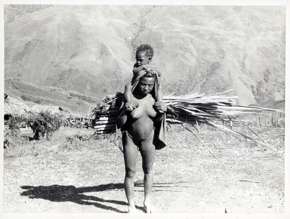 Women with a Child on her Shoulders