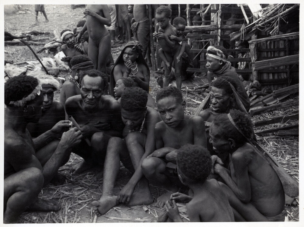 Group Gathered in Front of Buildings