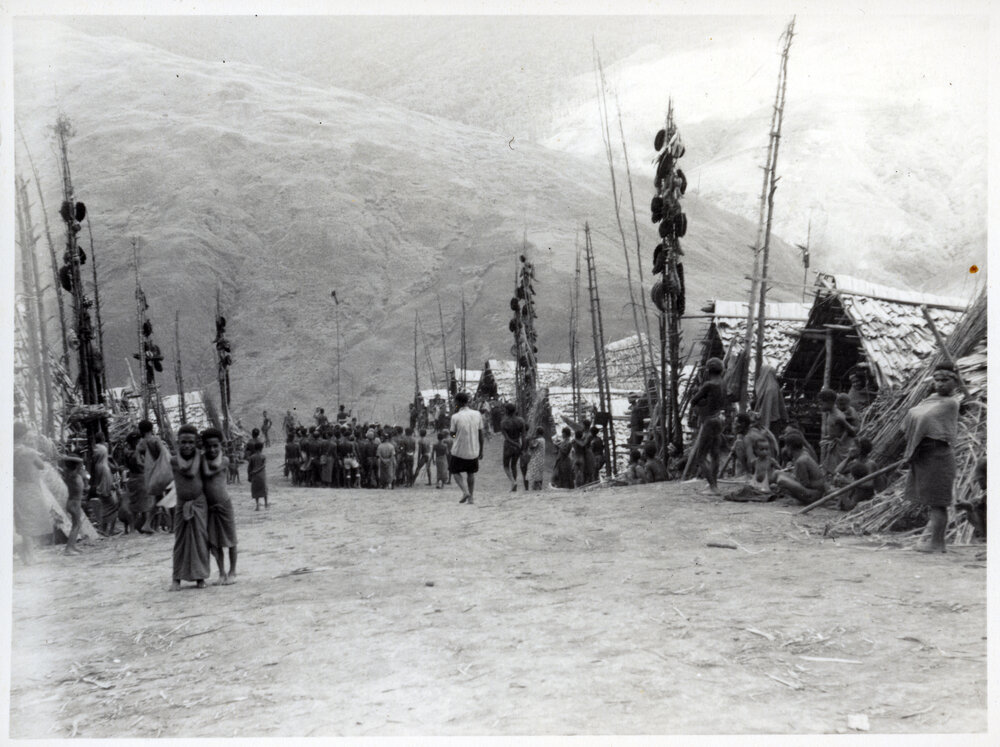 Groups of People Gathered in Hamlet