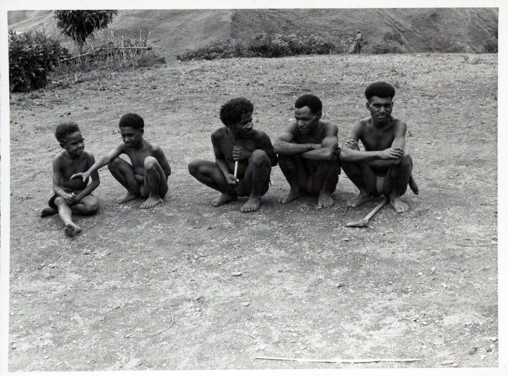 Men and Children Sitting