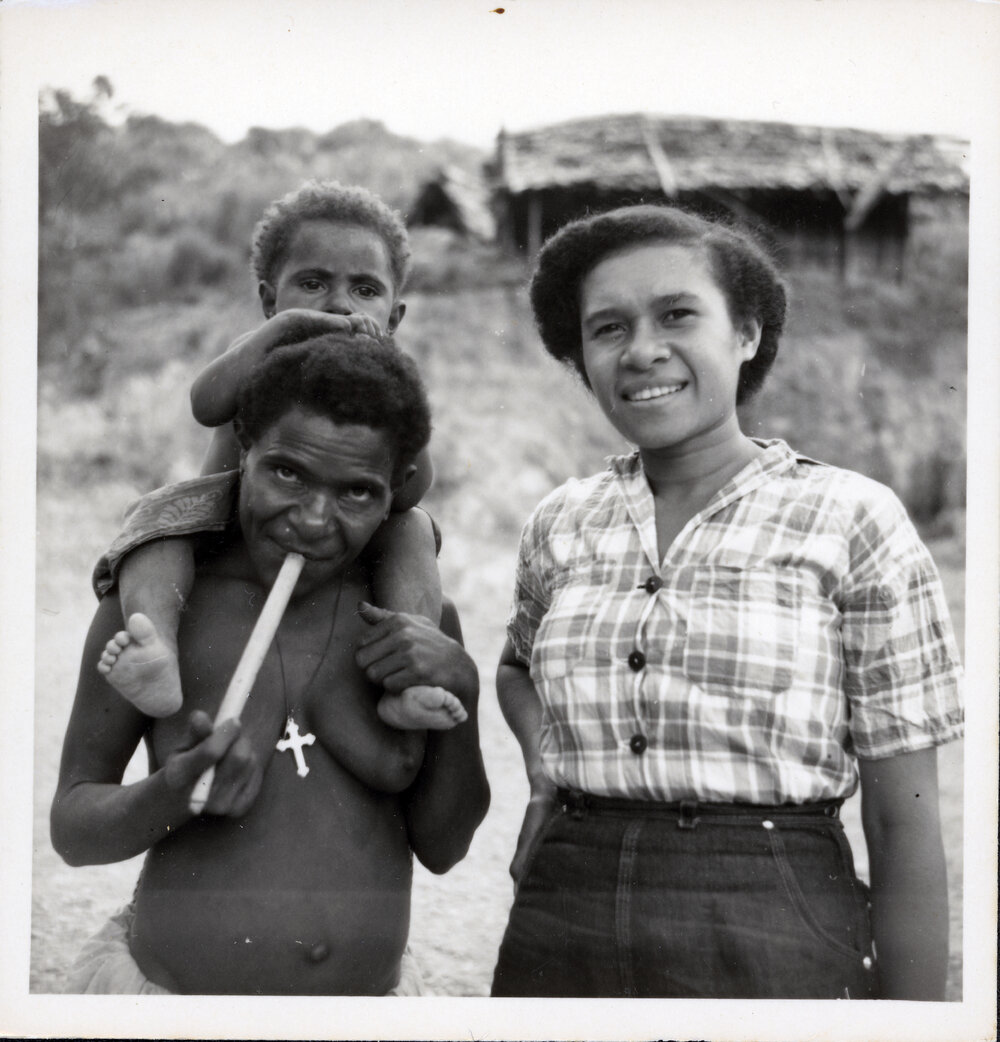 Two Women with a Child