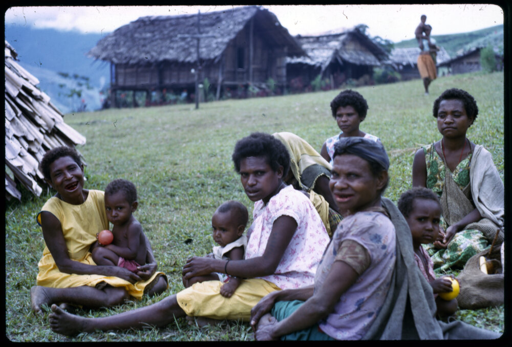 Group of Women and Children Sitting