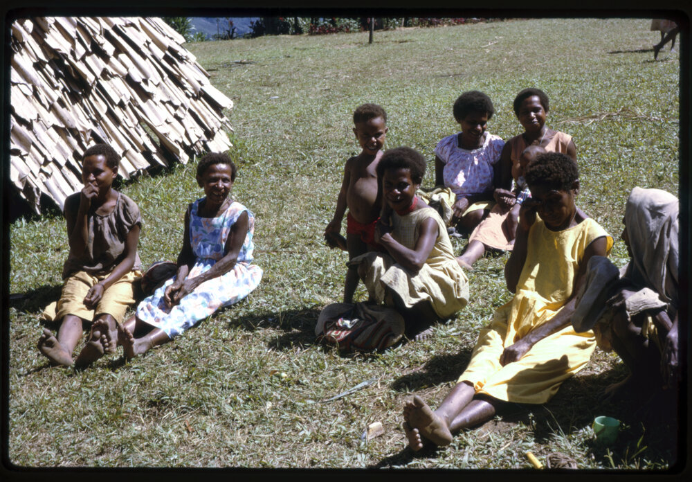 Group of Women and Children Sitting