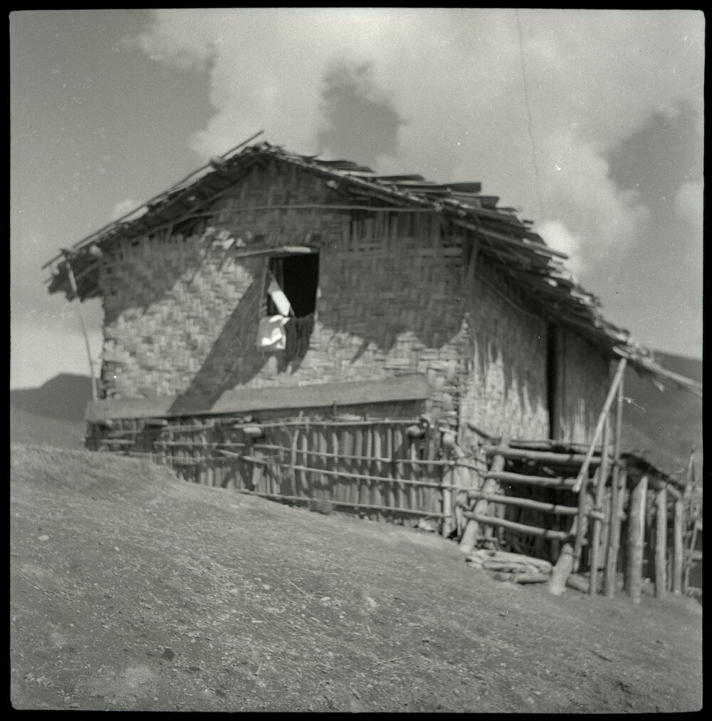 Building With Woven Walls and Raised Porch
