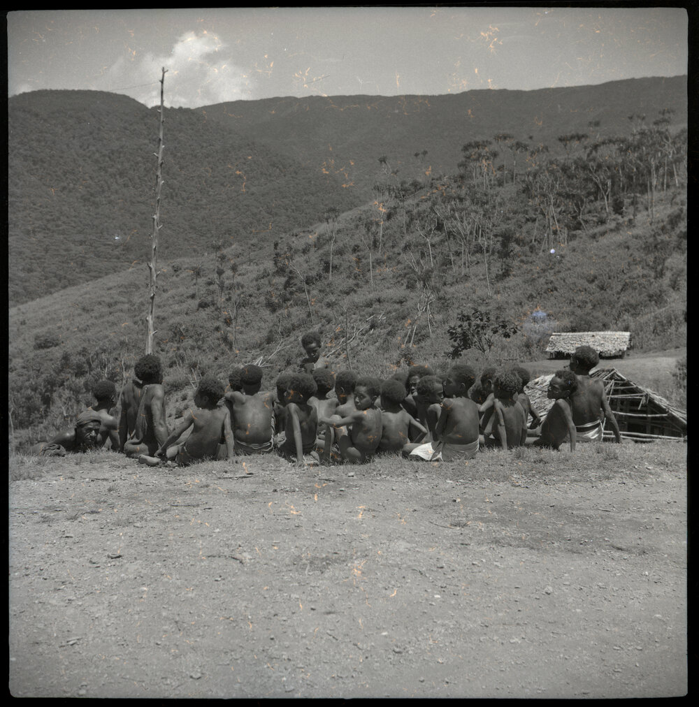 Group Seated, Viewed from Behind