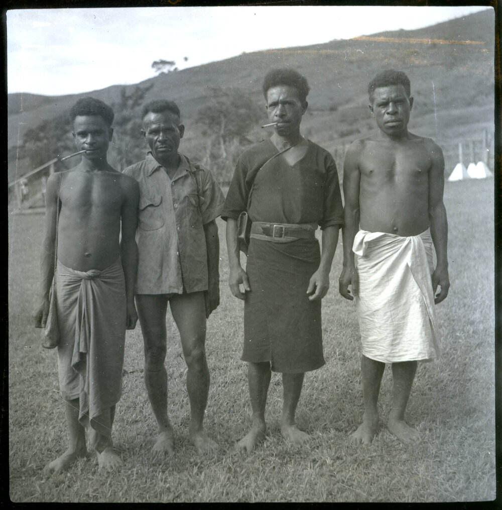 Four Men, Two With Cigarettes