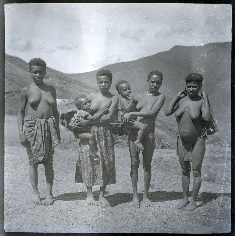 Three Women, Two Holding Children