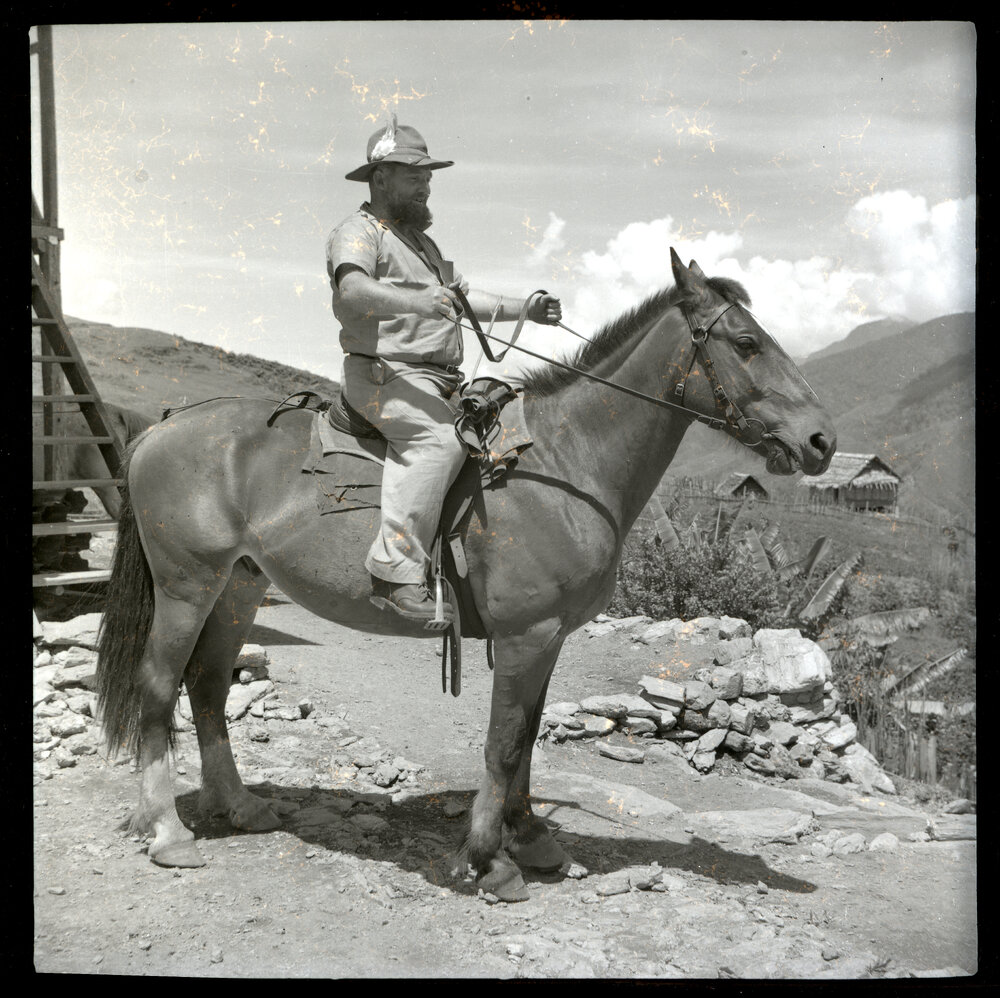 Man Mounted on Horse