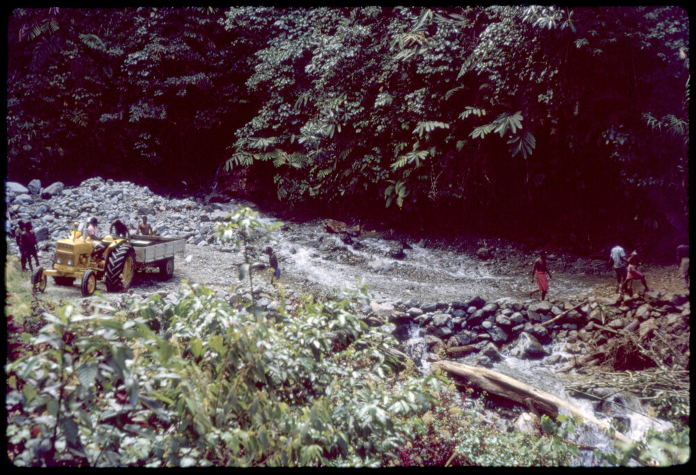 Tractor Beside a River