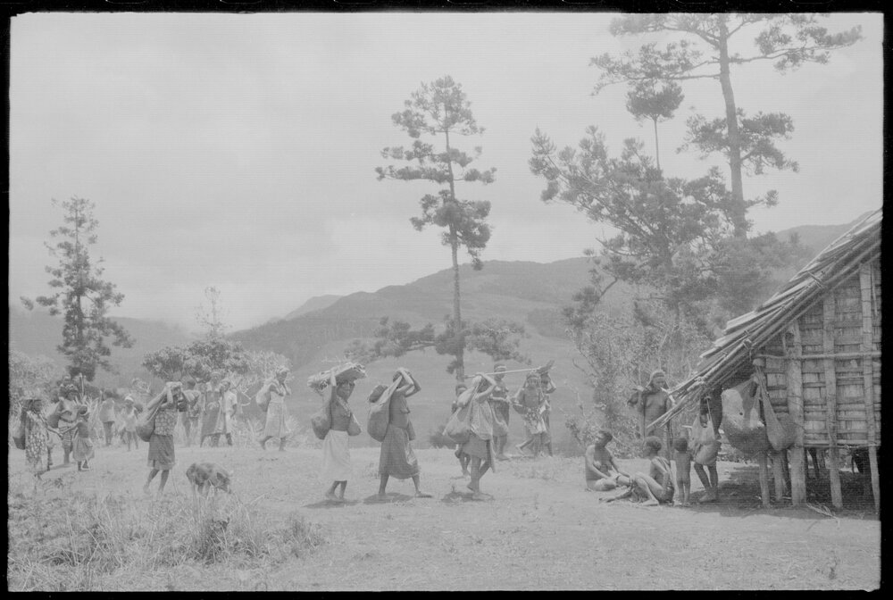 Group of Women Carrying Net Bags