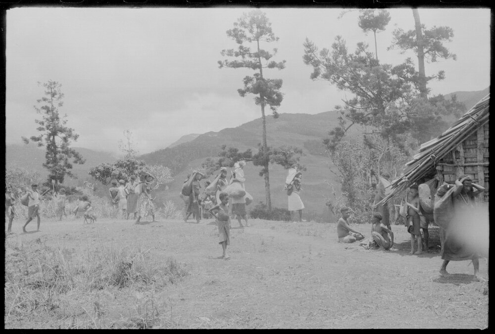 Group of Women Carrying Net Bags
