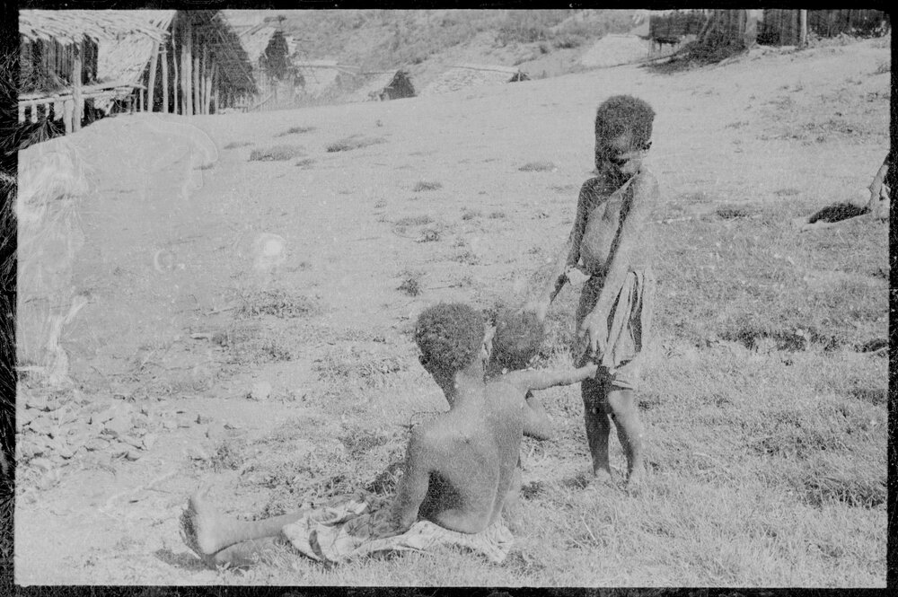 Woman with Baby and Child