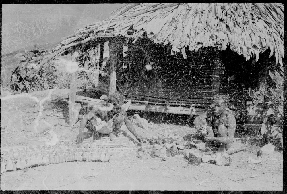 Men Preparing Pandanus Nut