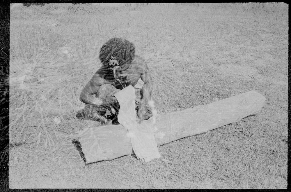 Man Processing Tree Bark