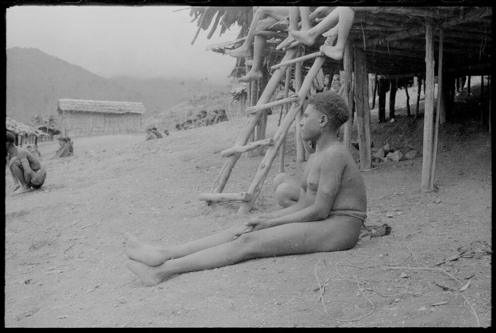 People Sitting Outside a Building