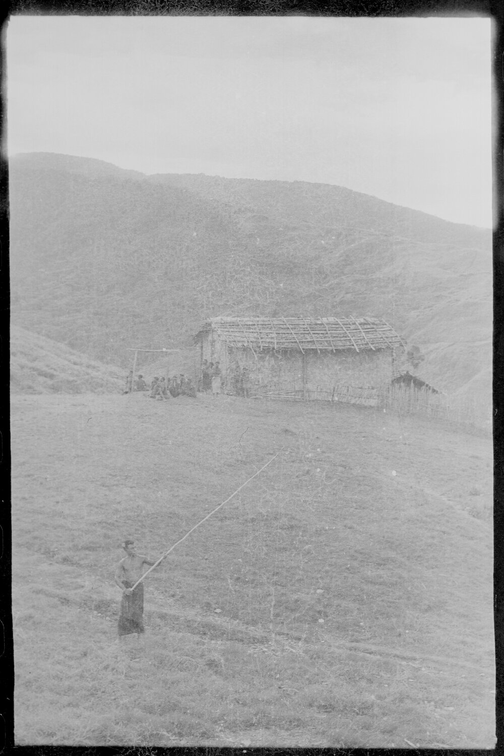 Man Performing with Long Spear