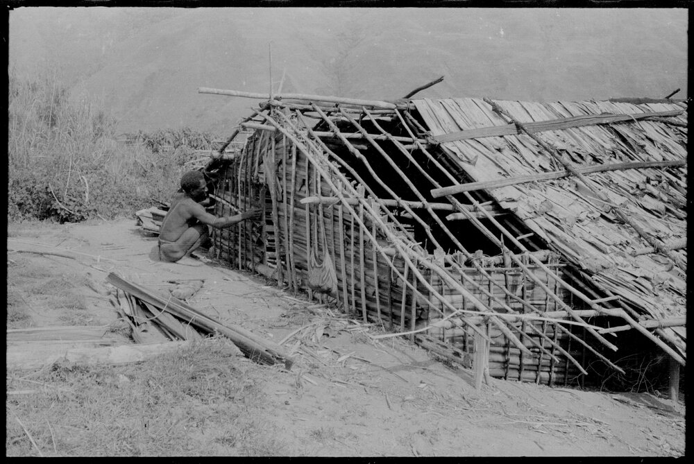 Man Constructing Building
