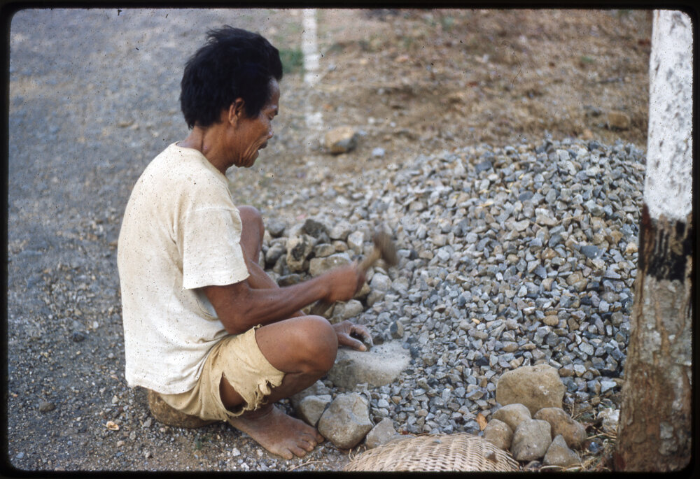 Man Breaking Rocks