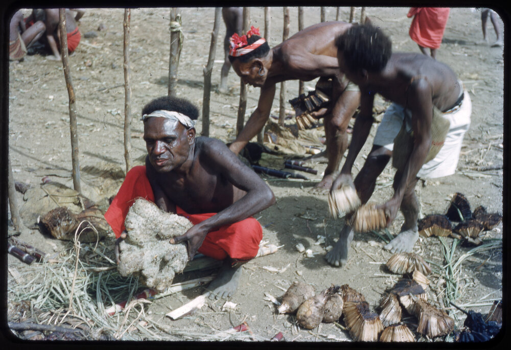 Men Distributing Food
