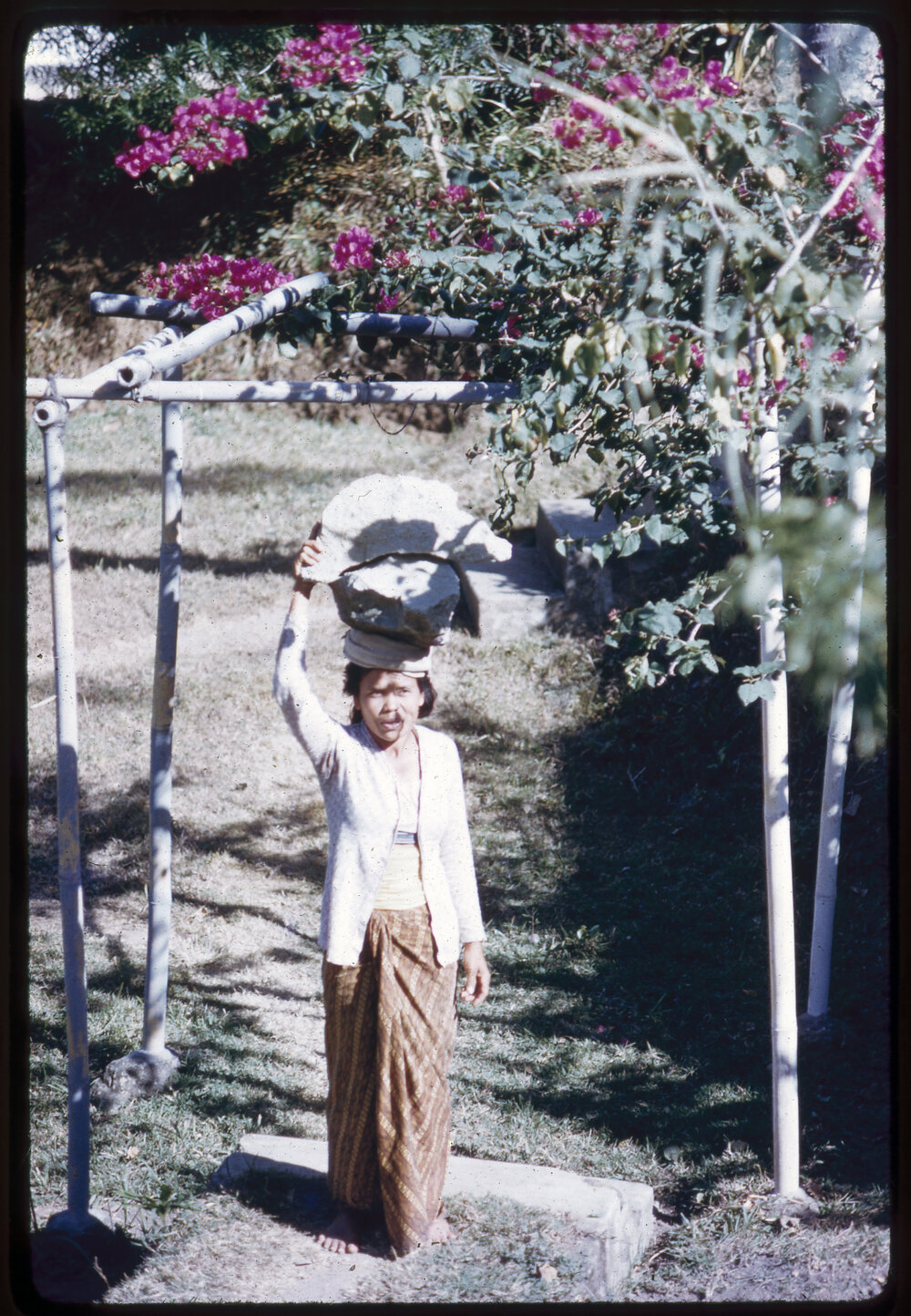 Woman Carrying Object on her Head