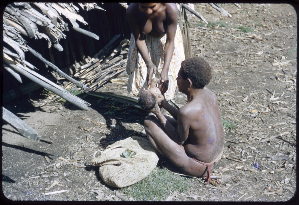 Women Sitting with Baby