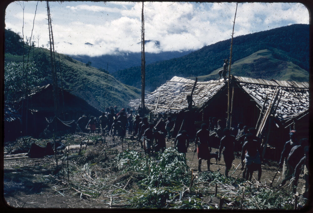 Group Standing in Mountainside Village