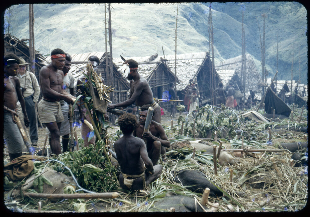Men Preparing for a Ceremony