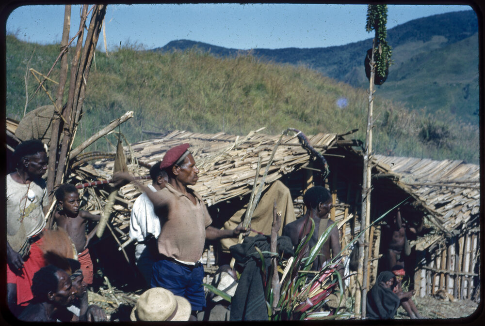 Group Standing Outside Buildings
