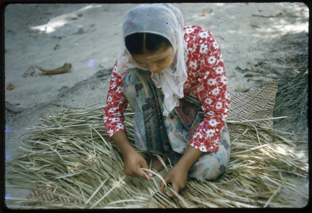 Woman Making a Pandanus Mat