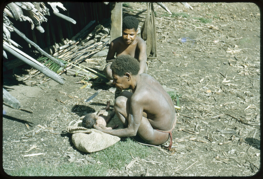 Women Sitting with Baby
