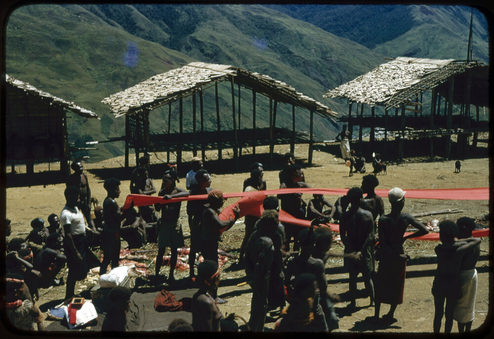 Group Unravelling Spools of Cloth