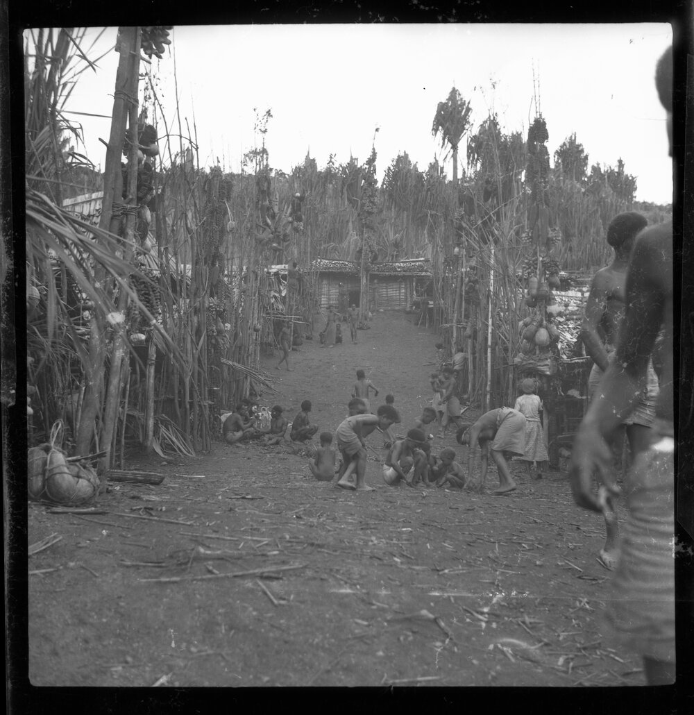 Village with Food Poles Outside Buildings
