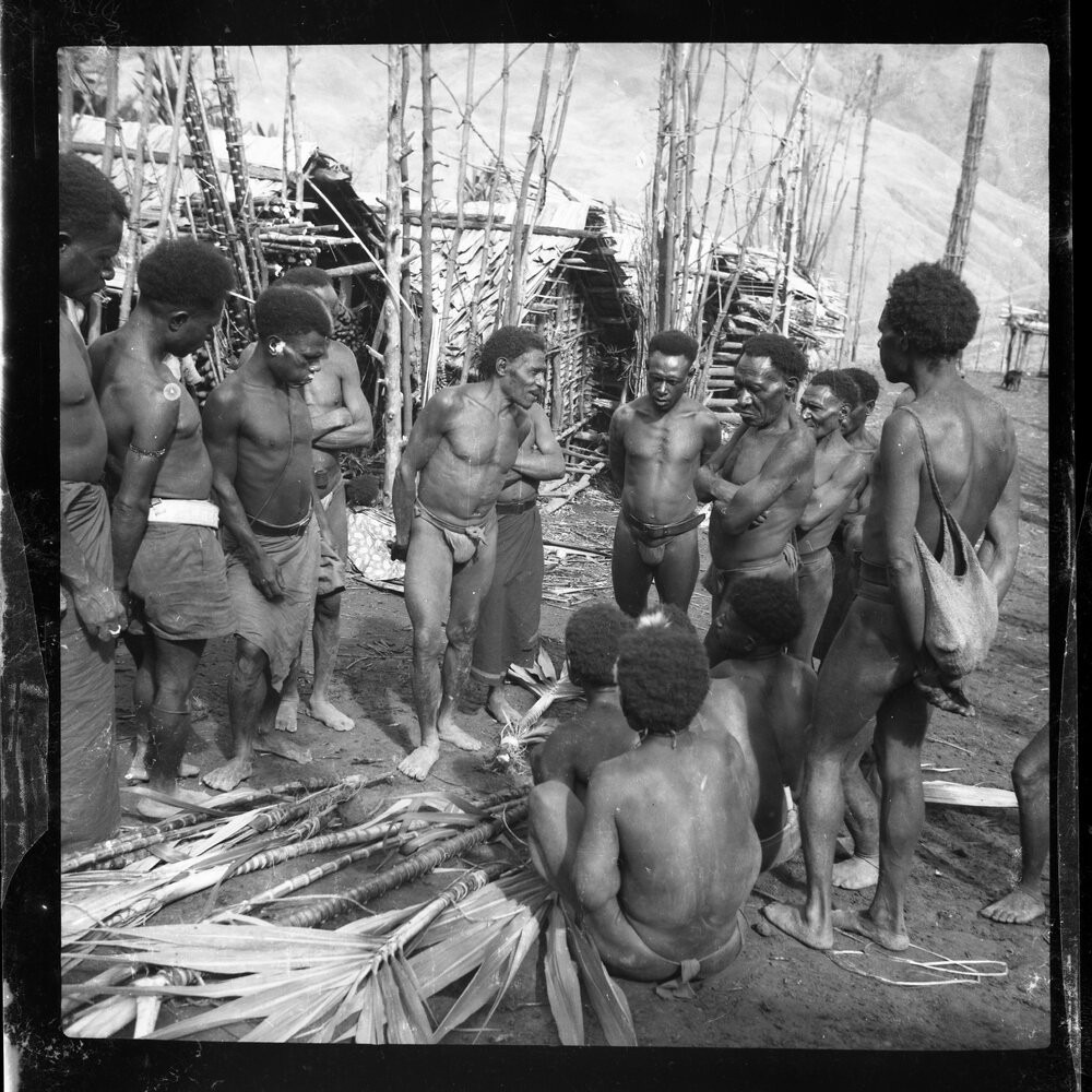 Men Gathered in a Village