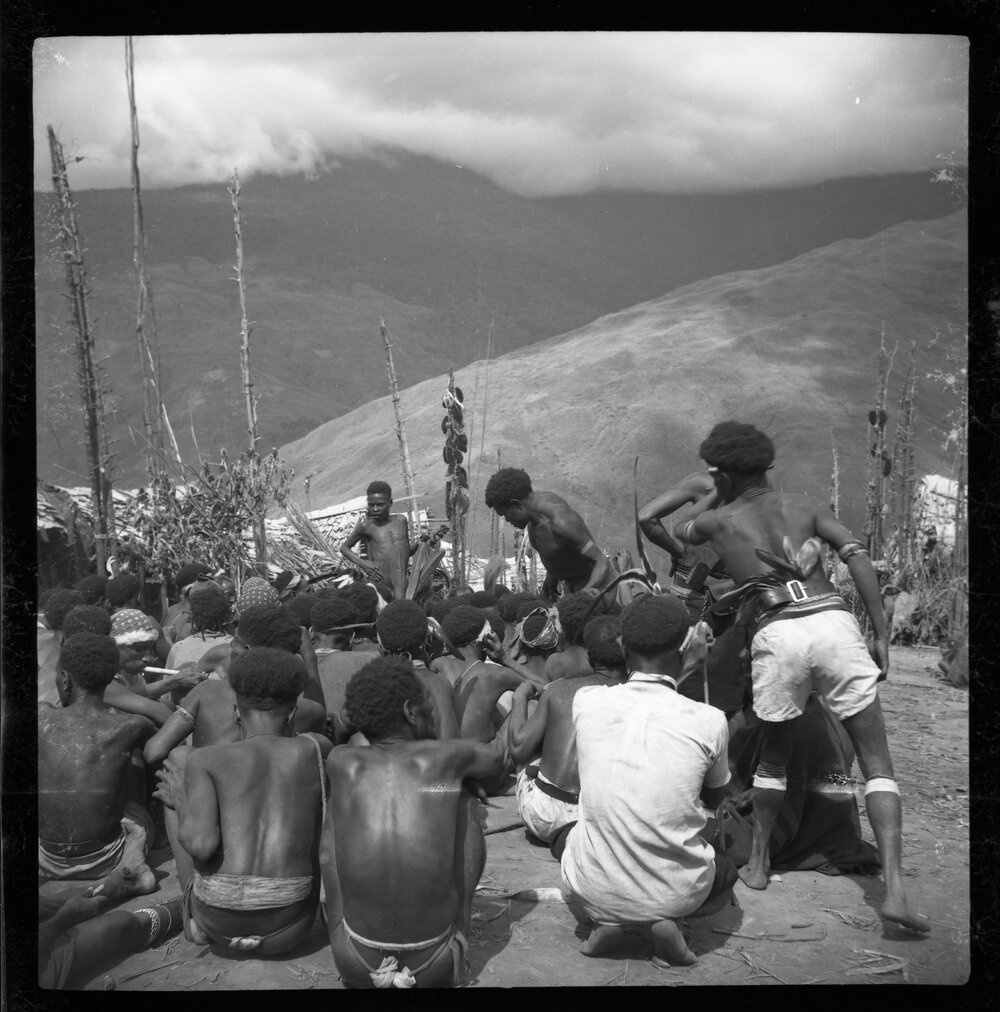 Group Sitting in Mountainside Village